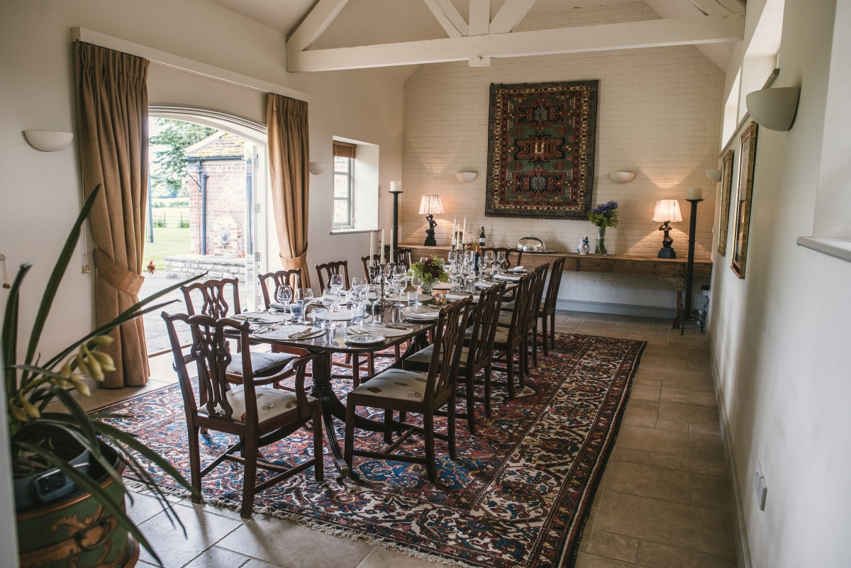 Farmhouse dining room comfortably seats 16